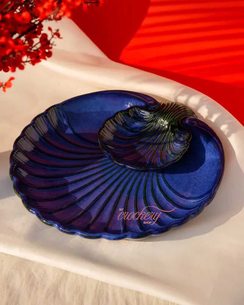 Blue ceramic chip and dip platter – a unique crockery piece for stylish serving.