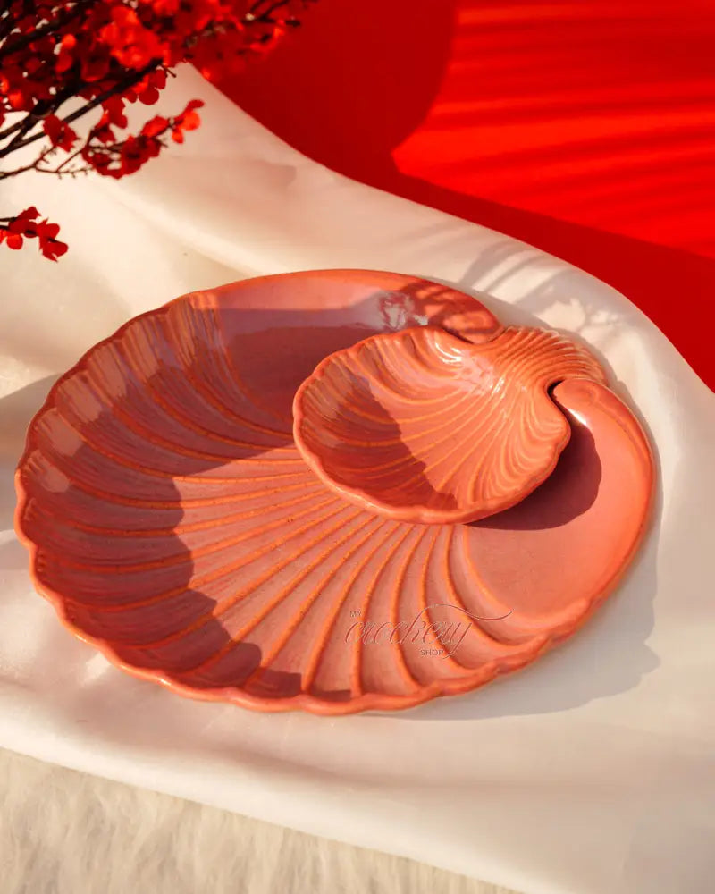 Pink ceramic chip and dip platter – a unique crockery piece for stylish serving.